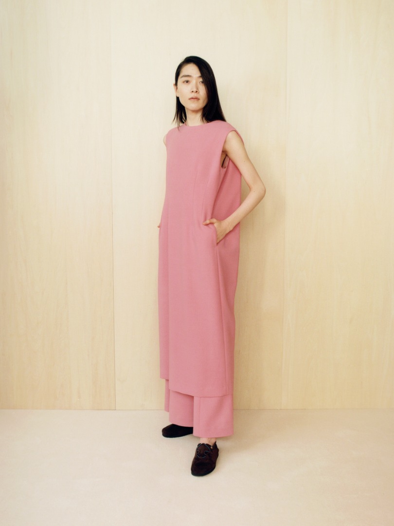 Taira wears Tense Wool Double Cloth Dress in Pink
