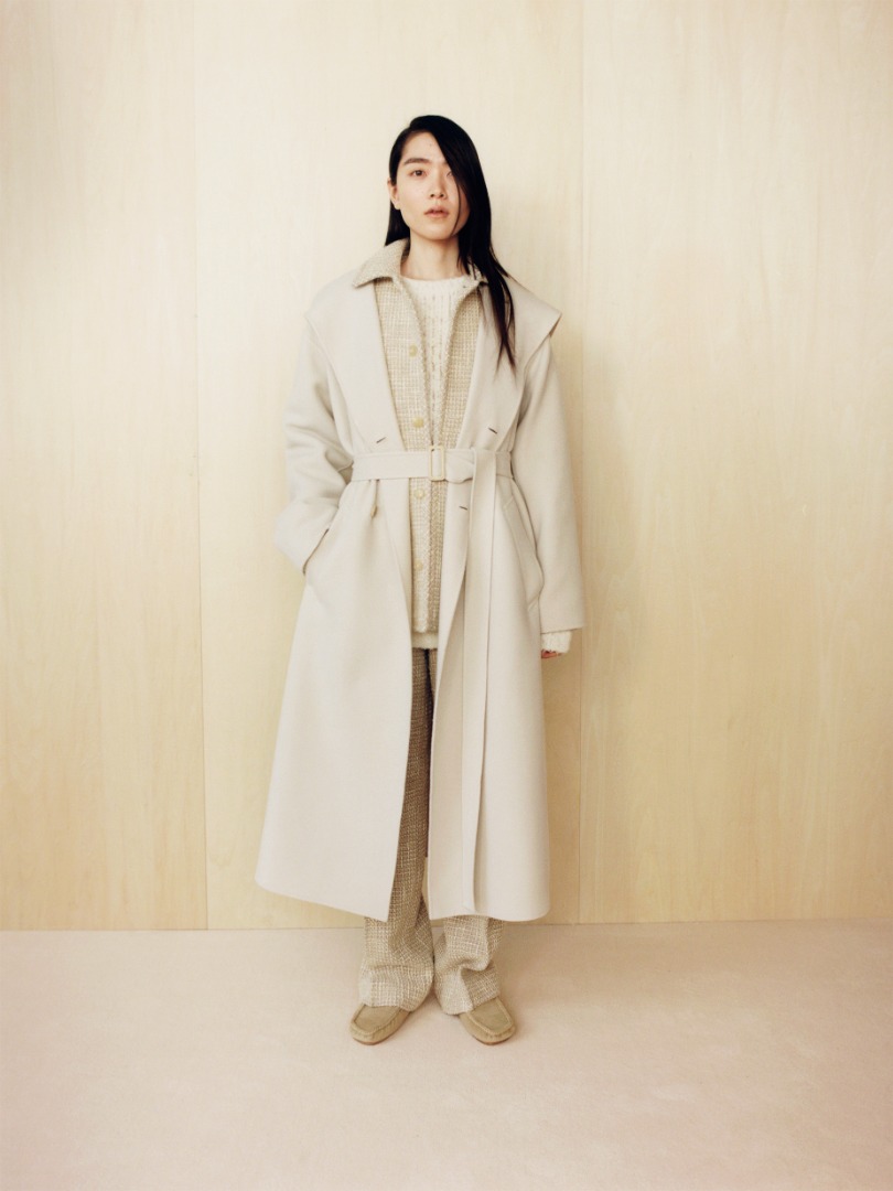 Taira wears Velour Brushed Wool Melton Hand Sewn Hooded Double Coat in Ivory White