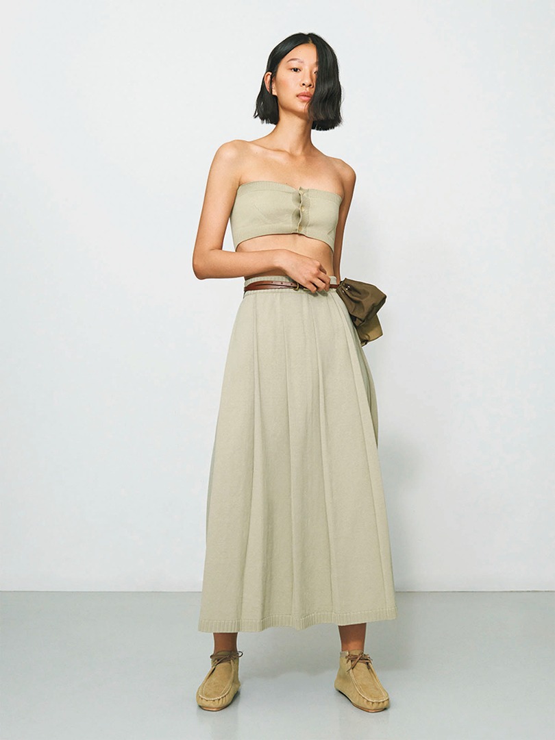 Hsiang wears Dry Cotton Knit Bandeau in Khaki Beige, Dry Cotton Knit Pleated Skirt in Khaki Beige